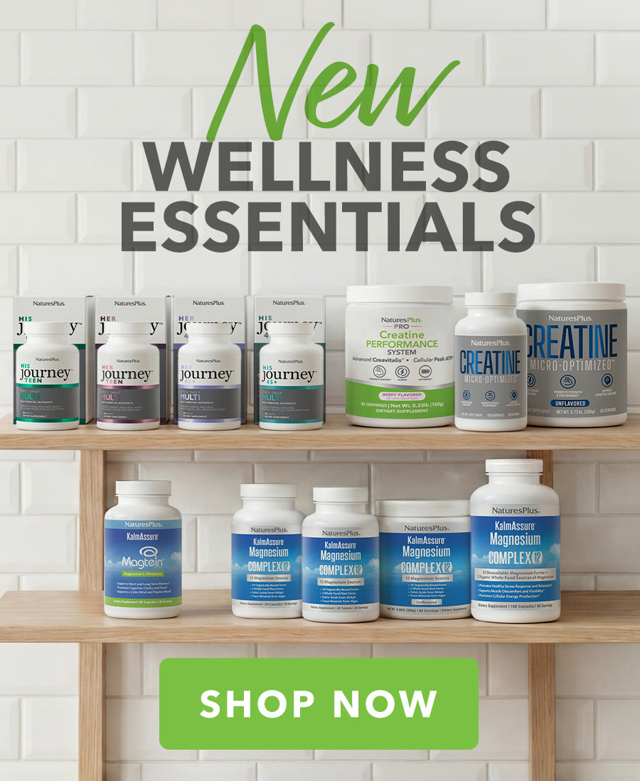 Shop New Wellness Essentials. Banner featuring various Natures Plus supplement bottles on wooden shelves.