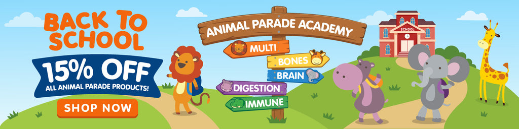Animal Parade back-to-school promotional banner featuring cartoon jungle animals, a school scene, and Animal Parade Academy signposts highlighting Multivitamin, Bones, Brain, Digestion, and Immune support, with a “15% Off All Animal Parade Products” offer and a “Shop Now” button.